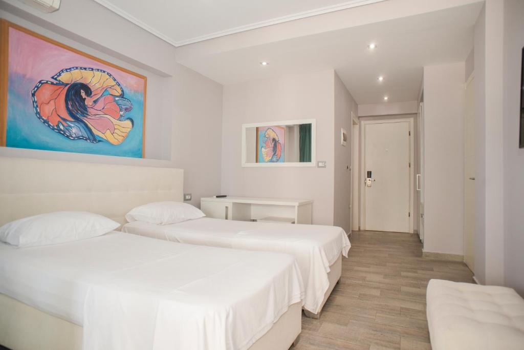 Postel nebo postele na pokoji v ubytování Hotel Saranda International