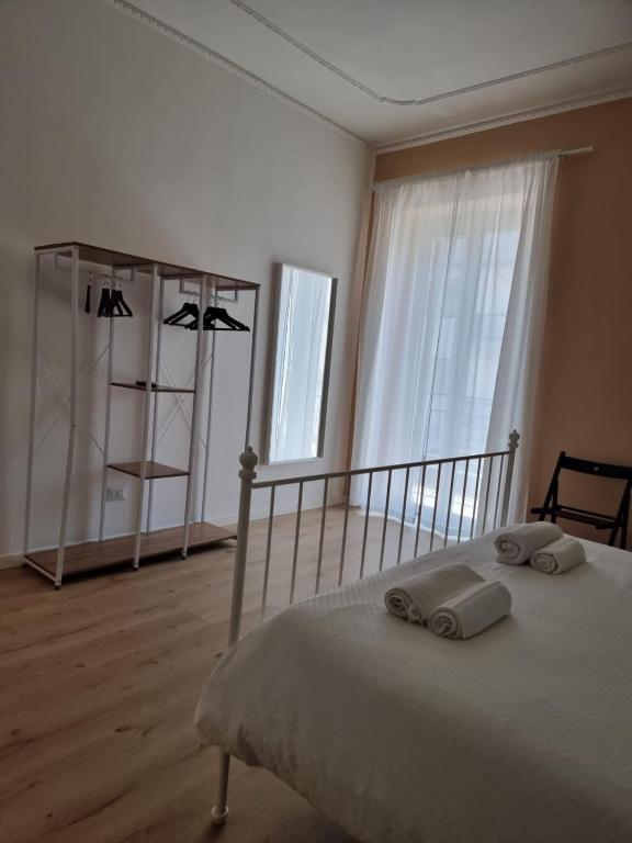Postel nebo postele na pokoji v ubytování Three Rooms Alghero