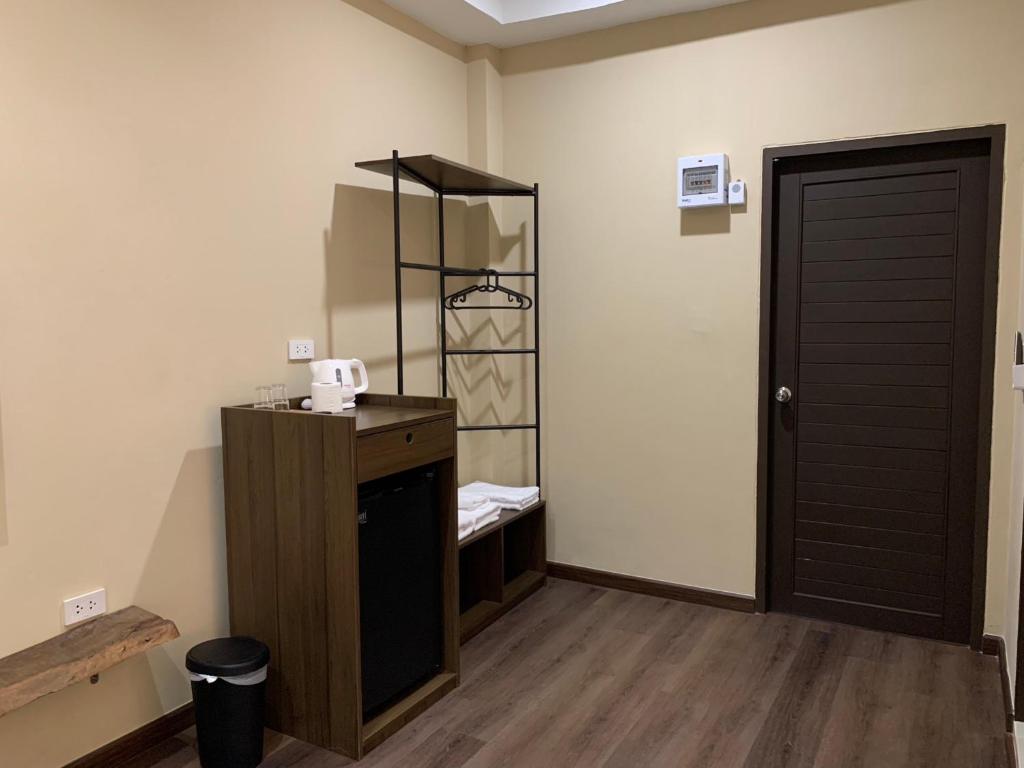 Postel nebo postele na pokoji v ubytování Suncloud Hotel Koh Samet