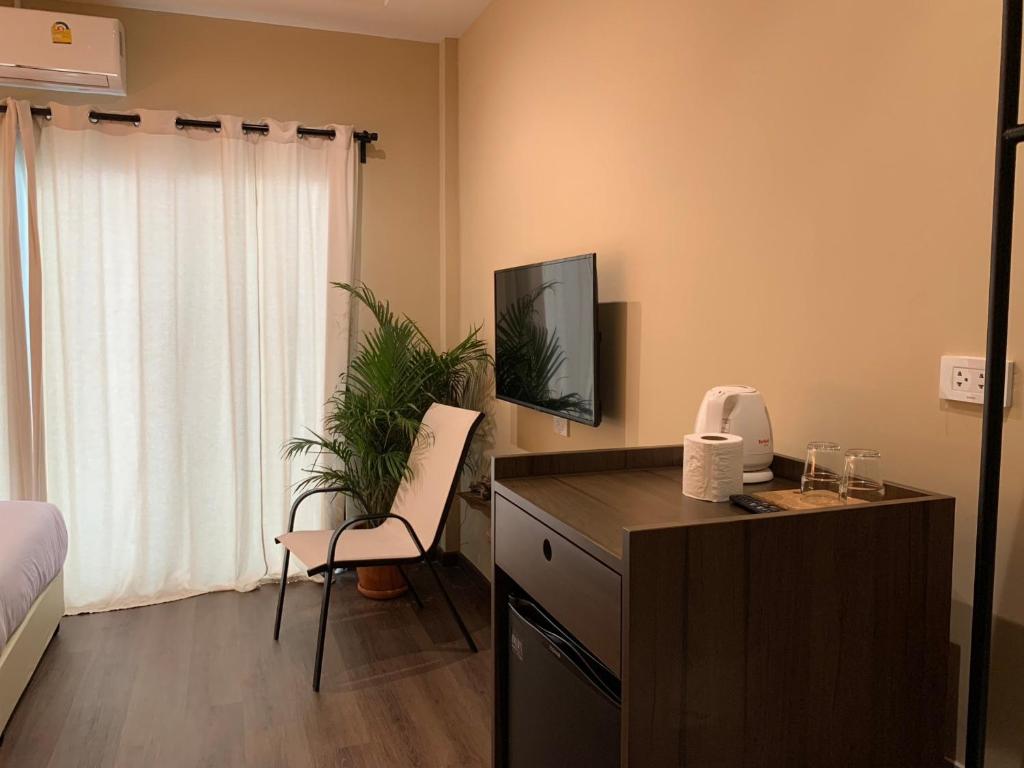 TV a/nebo společenská místnost v ubytování Suncloud Hotel Koh Samet