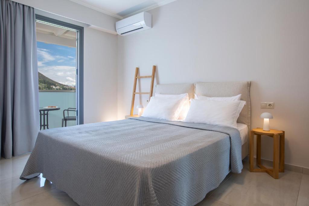 Letto o letti in una camera di Zisis Suites