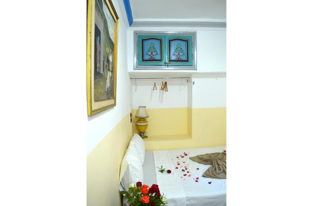 Postel nebo postele na pokoji v ubytování Riad Wink
