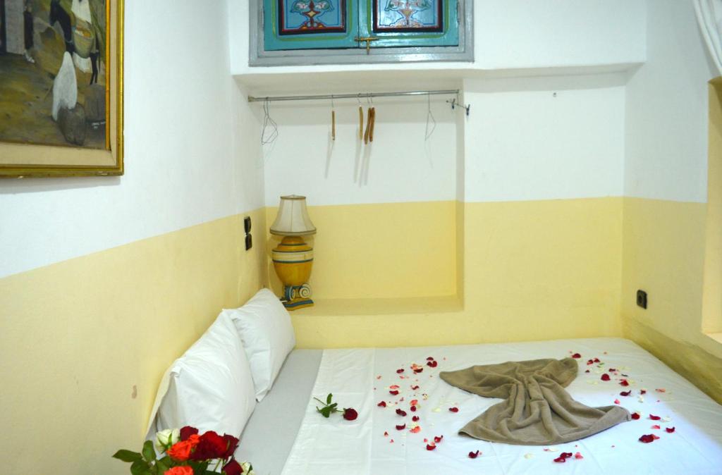 Postel nebo postele na pokoji v ubytování Riad Wink