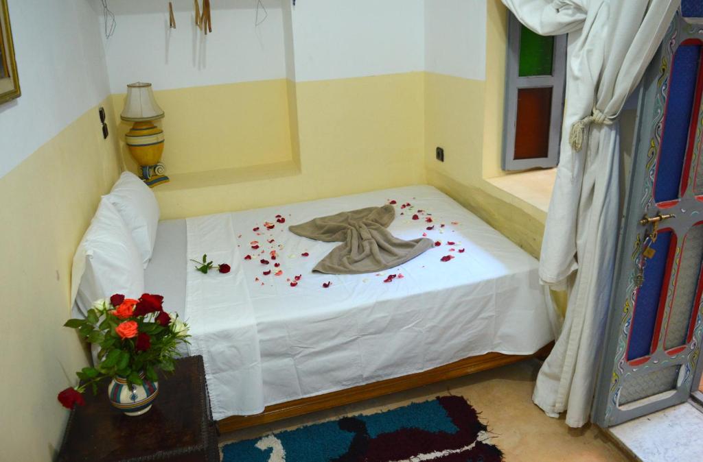 Postel nebo postele na pokoji v ubytování Riad Wink