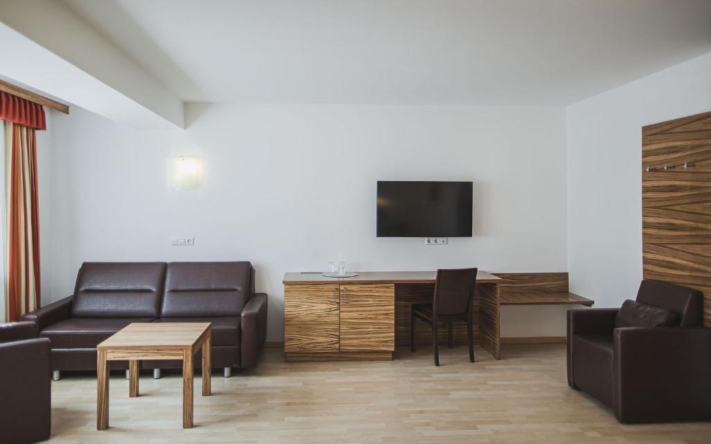 TV a/nebo společenská místnost v ubytování Hotel Brötz