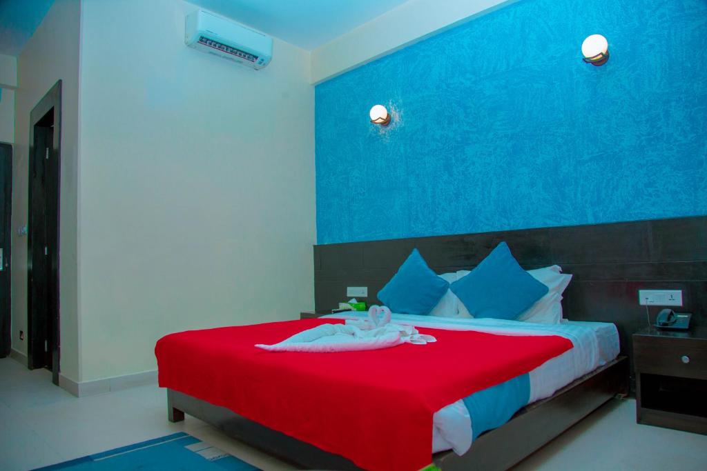 Giường trong phòng chung tại Tuki Resort Pokhara