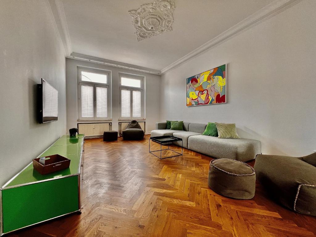 a living room with a couch and a table at Pott Perle in Duisburg