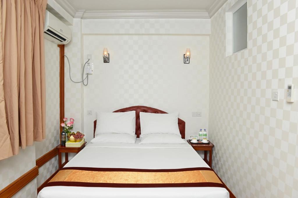 Posteľ alebo postele v izbe v ubytovaní Hotel Grand United - Chinatown