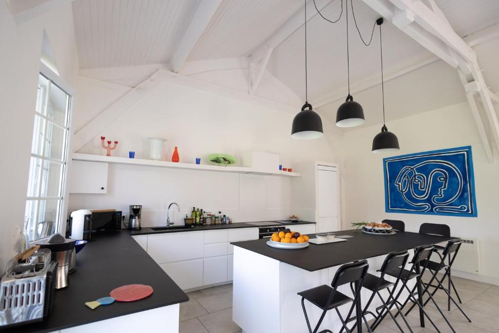Kuchyň nebo kuchyňský kout v ubytování La Métairie - Guesthouse