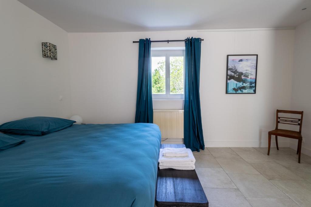 Postel nebo postele na pokoji v ubytování La Métairie - Guesthouse