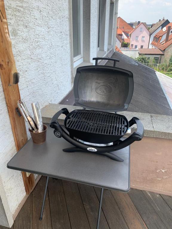 Gril dostupný pro hosty v apartmánu