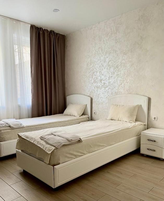 Postel nebo postele na pokoji v ubytování Hotel Lime