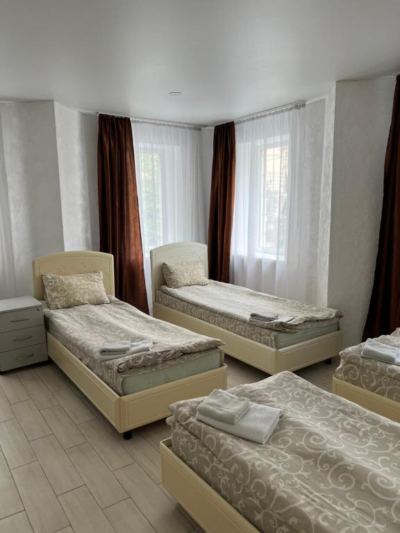 Postel nebo postele na pokoji v ubytování Hotel Lime
