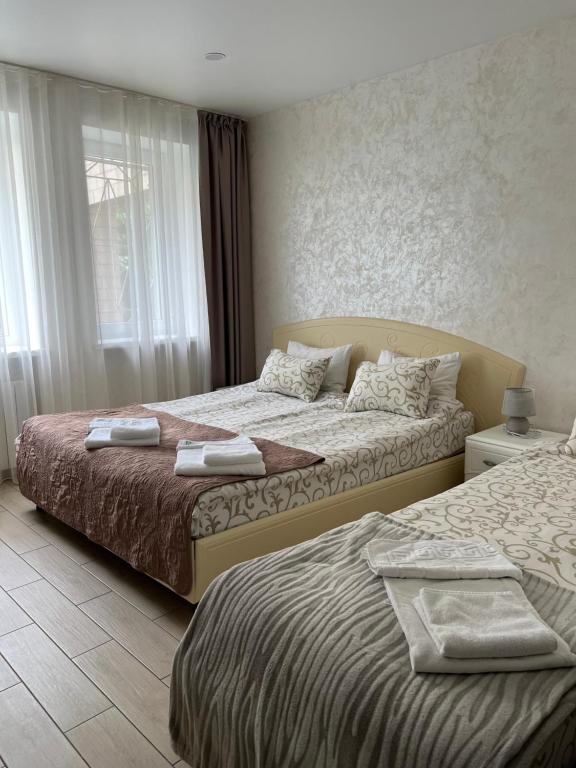 Postel nebo postele na pokoji v ubytování Hotel Lime