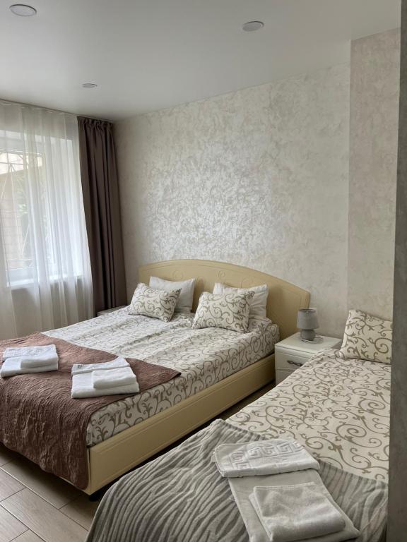 Postel nebo postele na pokoji v ubytování Hotel Lime