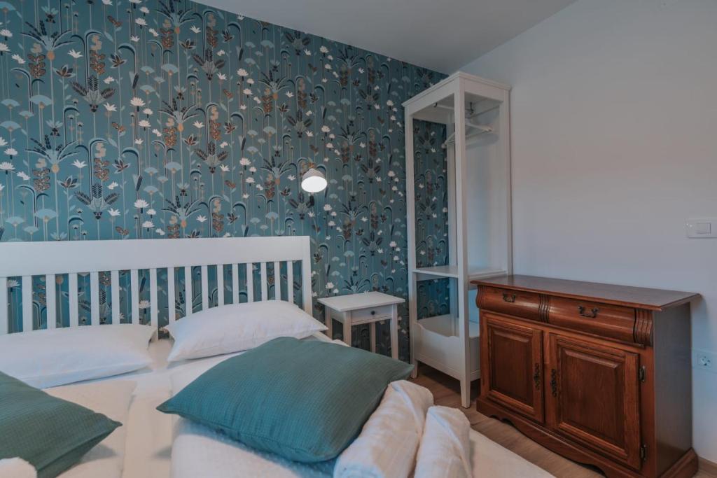 Postel nebo postele na pokoji v ubytování APARTMA LAMBERGER