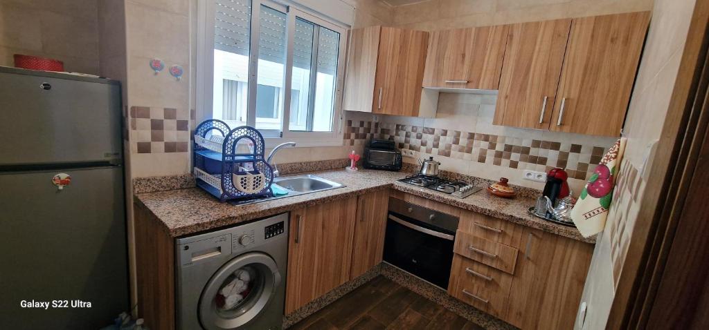Kuchyň nebo kuchyňský kout v ubytování Pink House Martil