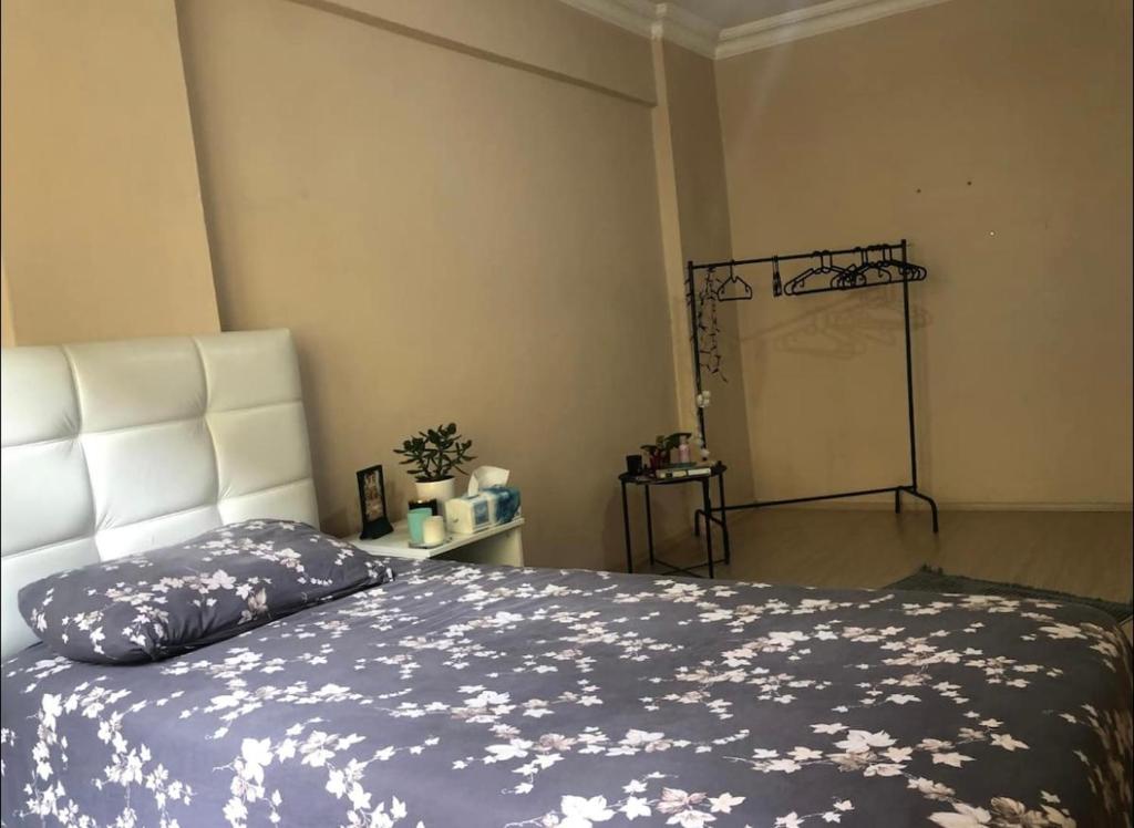 a bedroom with a bed and a basketball hoop at A room which close to the centre of Istanbul , 10 minutes to metro in Istanbul