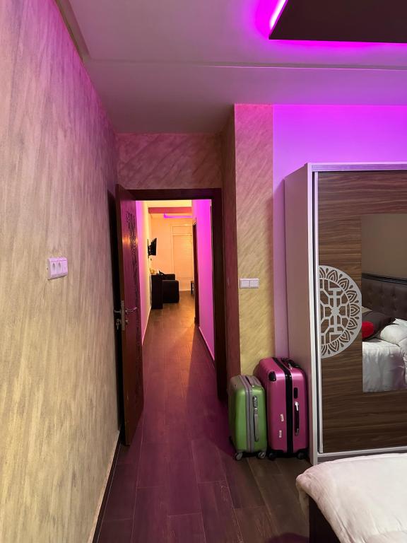 Postel nebo postele na pokoji v ubytování Pink House Martil