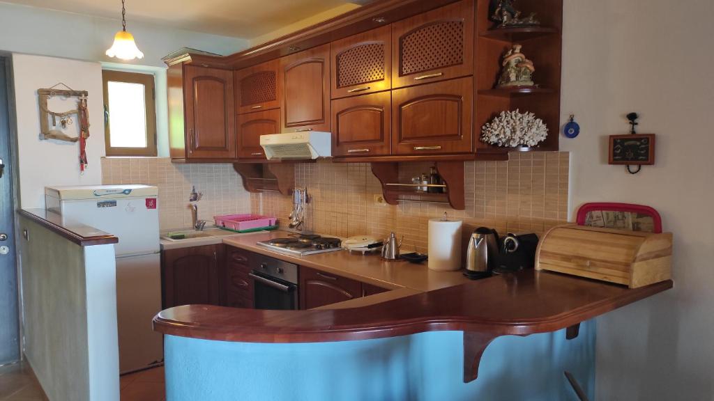 Kuchyň nebo kuchyňský kout v ubytování Q Bay Apartments