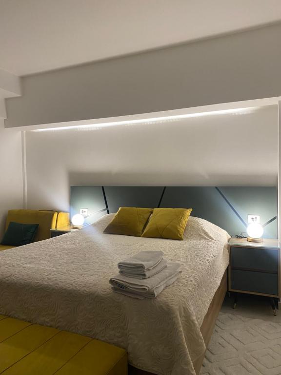 Postel nebo postele na pokoji v ubytování Seafront Apartments