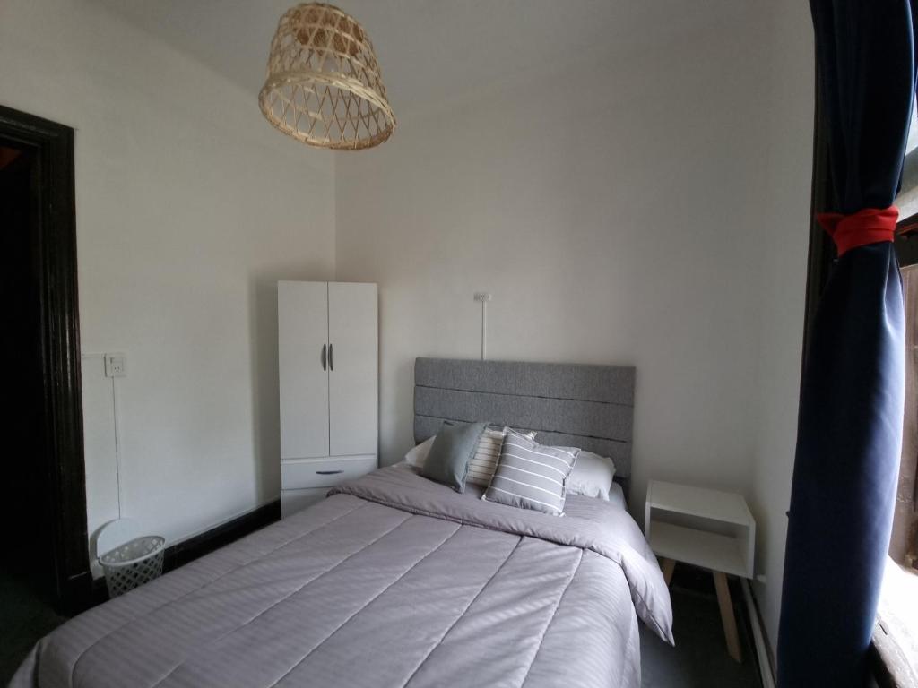 Postel nebo postele na pokoji v ubytování Katana Capsule Hostel