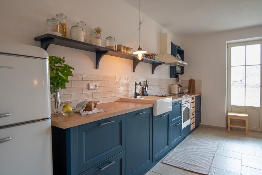 Kuchyň nebo kuchyňský kout v ubytování Apartmány Pernek