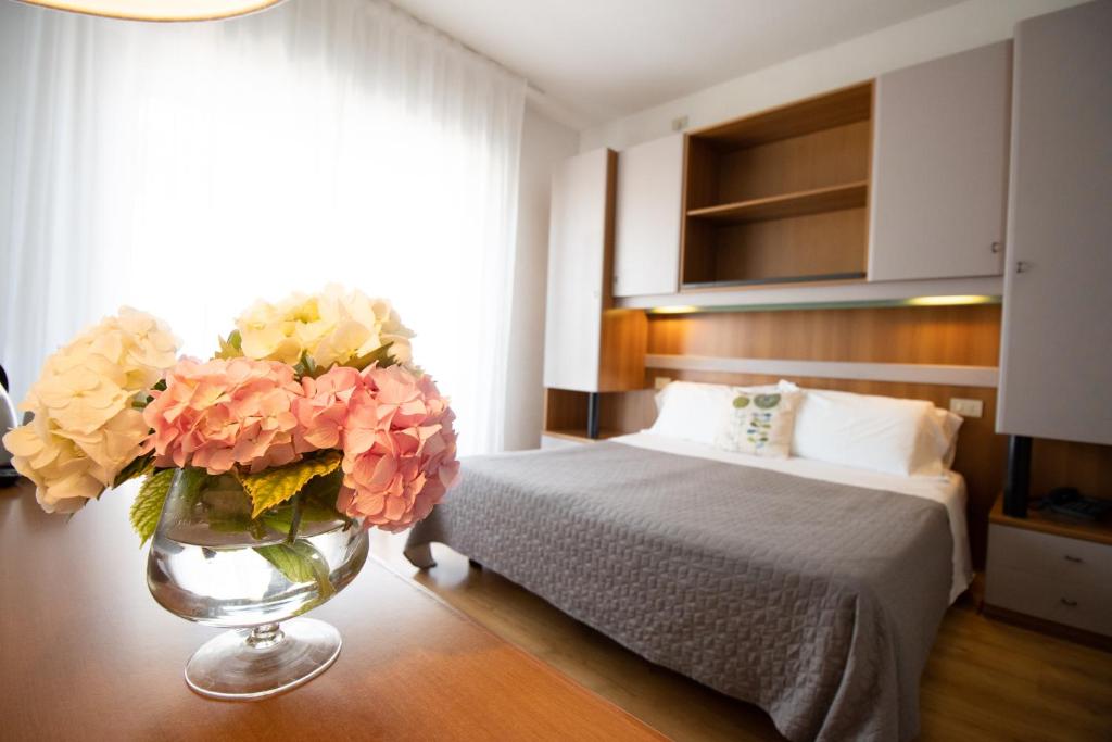 Postel nebo postele na pokoji v ubytování Hotel Crystal