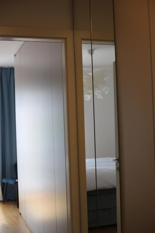 Llit o llits en una habitació de Mint Apartment