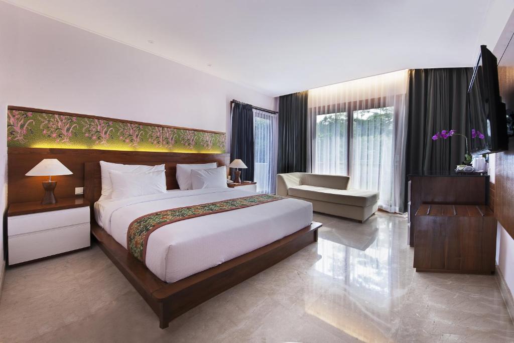 Postel nebo postele na pokoji v ubytování Ubud Wana Resort