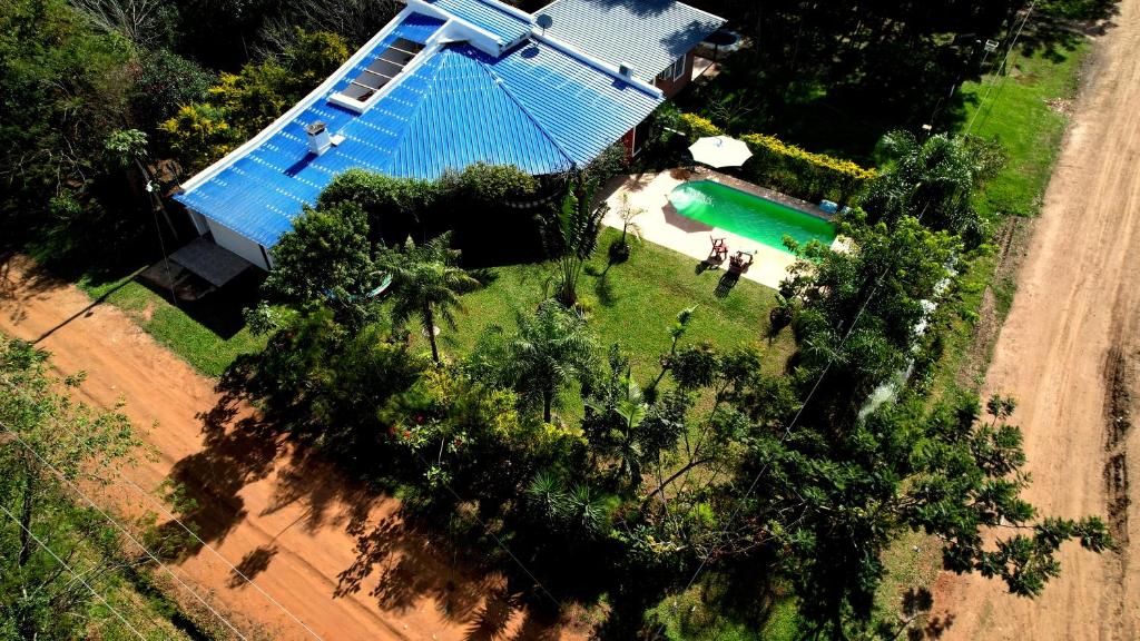 an overhead view of a house with a pool and trees at ALQUIMIA in Paso de la Patria