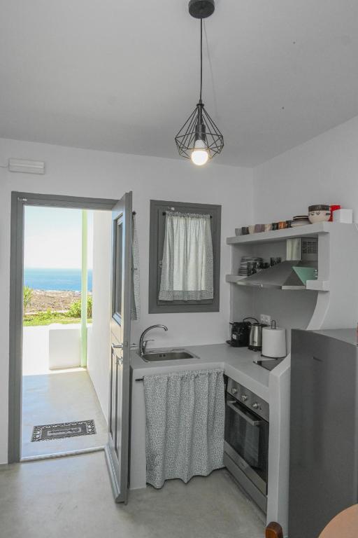 Kuchyň nebo kuchyňský kout v ubytování Aesthetic View Apartments