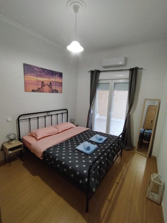 Posteľ alebo postele v izbe v ubytovaní Christopher Central Home Ioannina
