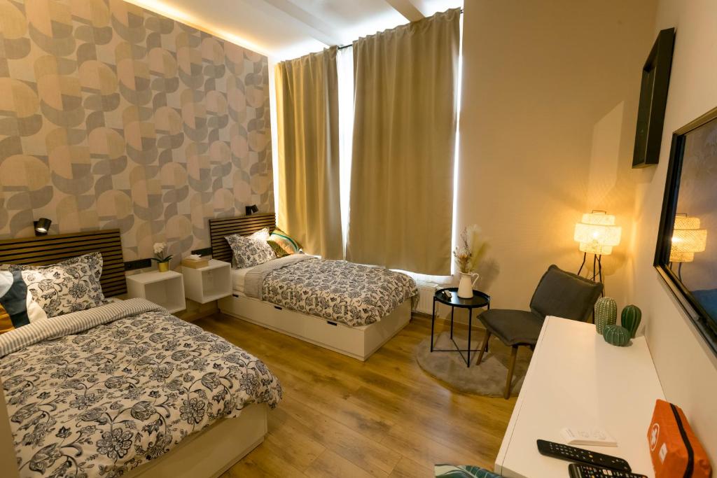 Postel nebo postele na pokoji v ubytování Golden Dove Luxury Aparts