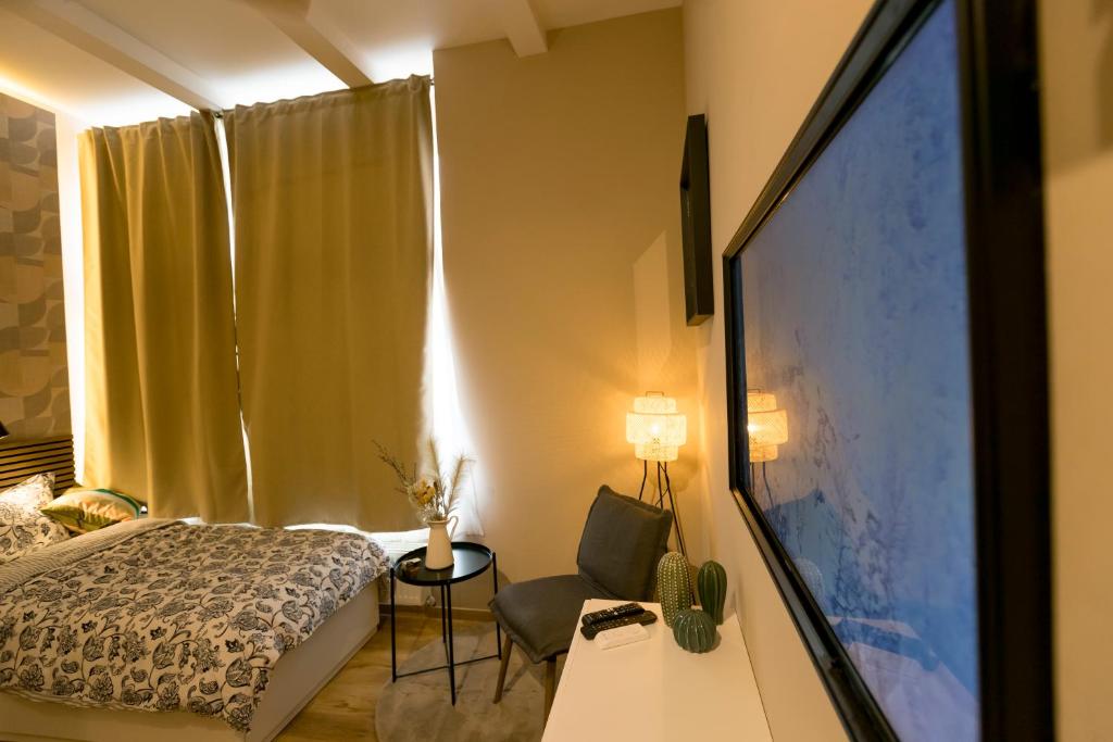 TV a/nebo společenská místnost v ubytování Golden Dove Luxury Aparts