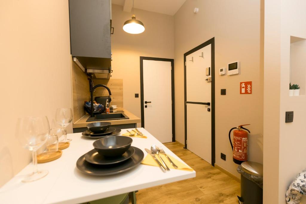 Kuchyň nebo kuchyňský kout v ubytování Golden Dove Luxury Aparts