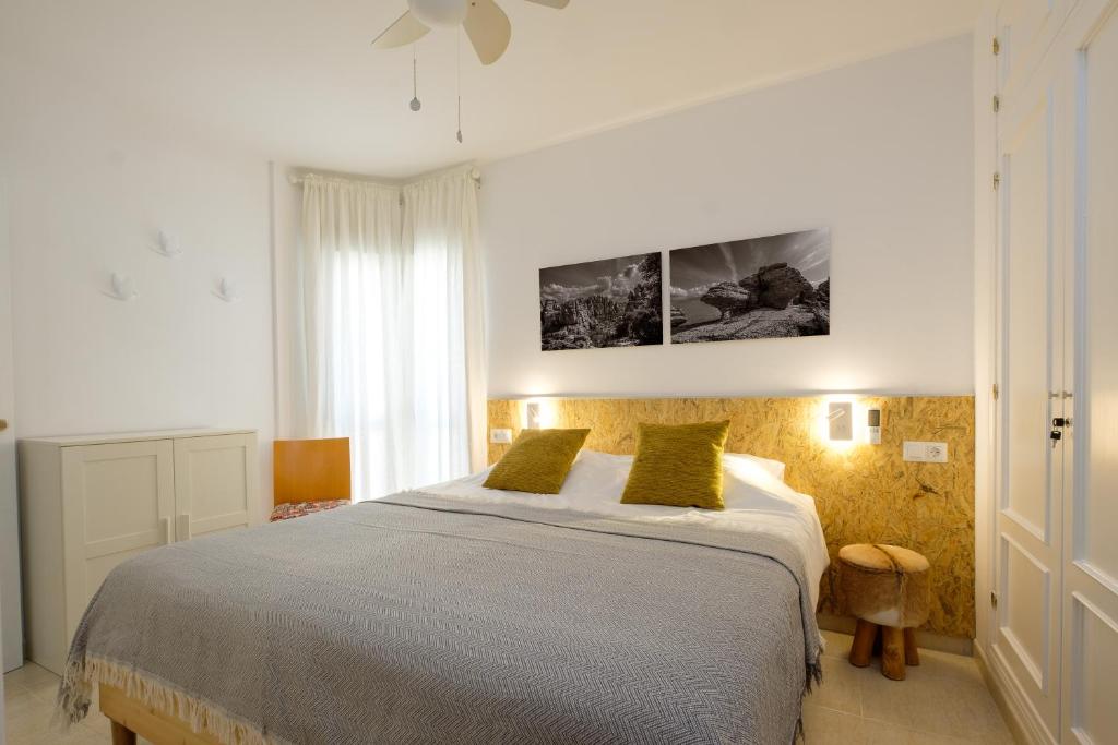 Łóżko lub łóżka w pokoju w obiekcie LOFT2STAY.COM