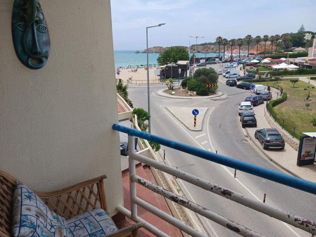 a balcony with a view of a street and a road at Villa Vau in Portimão
