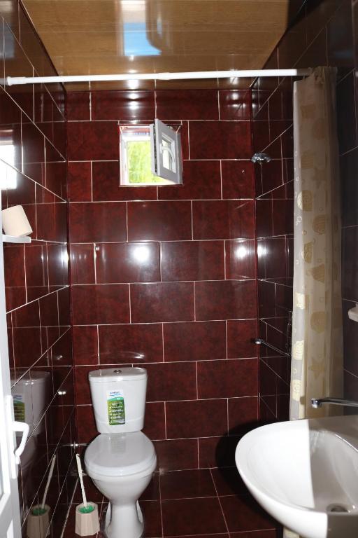 Koupelna v ubytování Taoskari Hotel
