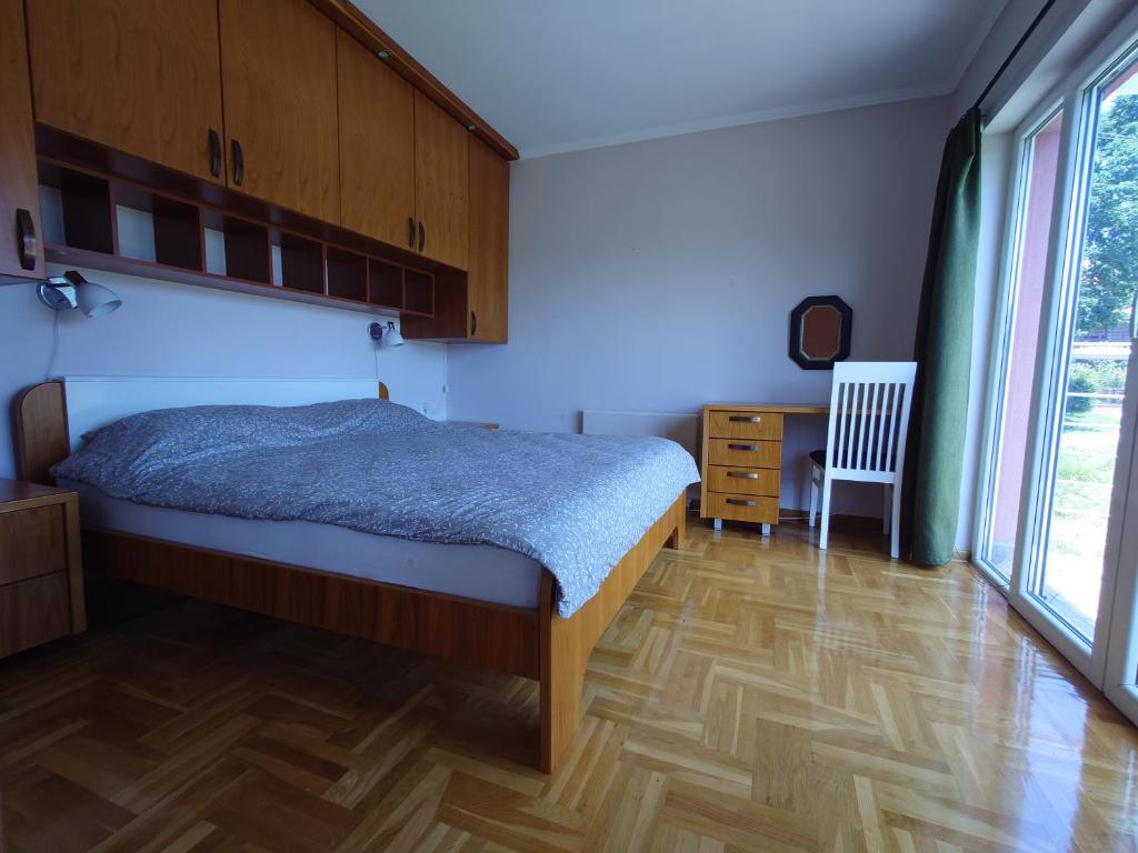 Postel nebo postele na pokoji v ubytování Apartman Hana