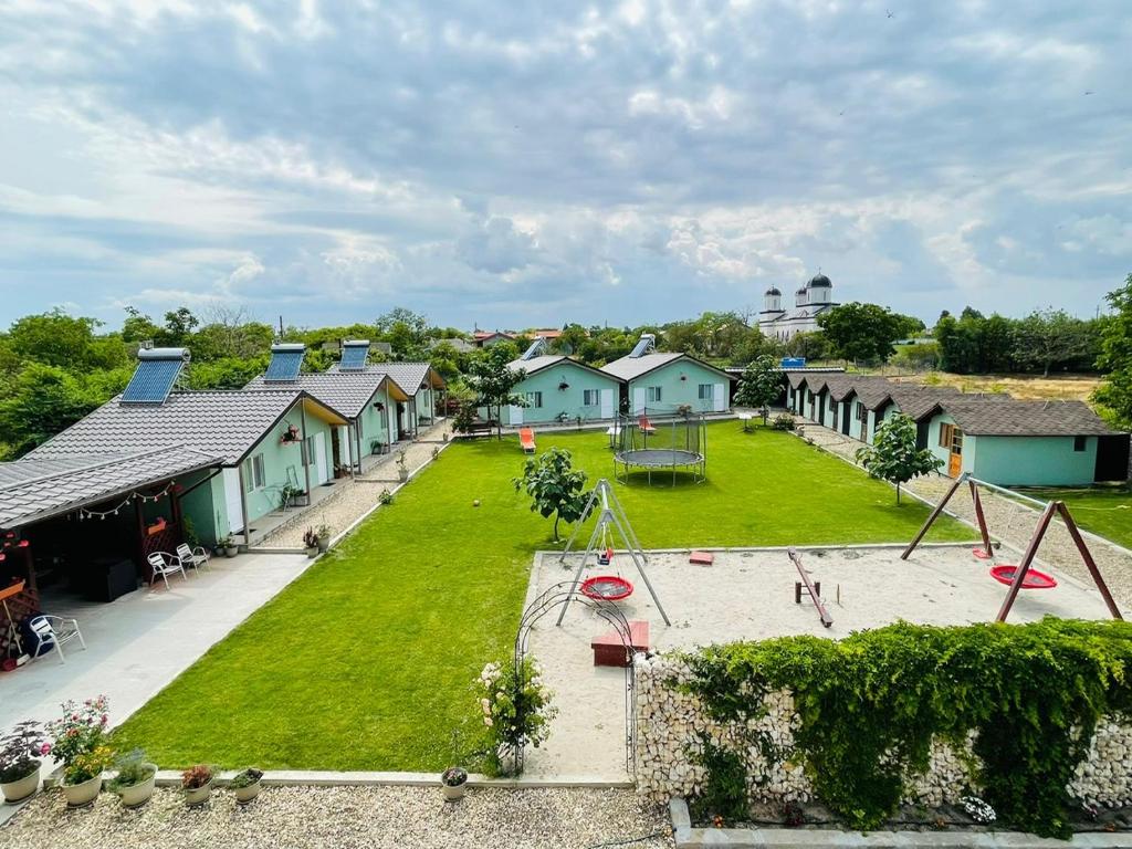 an aerial view of a park with a playground at Pensiunea Onyx Vadu in Vadu