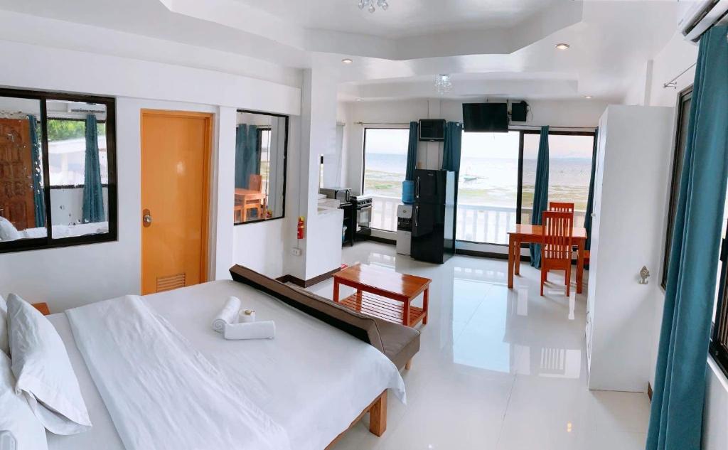 Postel nebo postele na pokoji v ubytování LUNA OSLOB TRAVELLERS INN - Beach Front