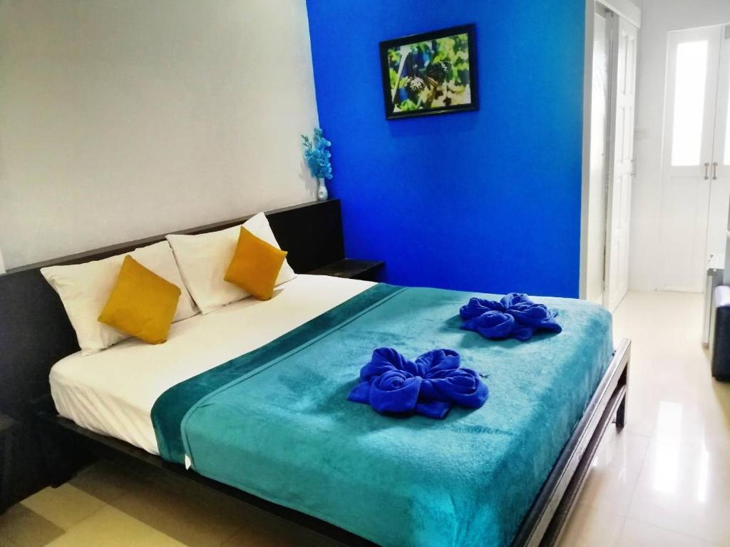Postel nebo postele na pokoji v ubytování Colorize Boutique Hotel