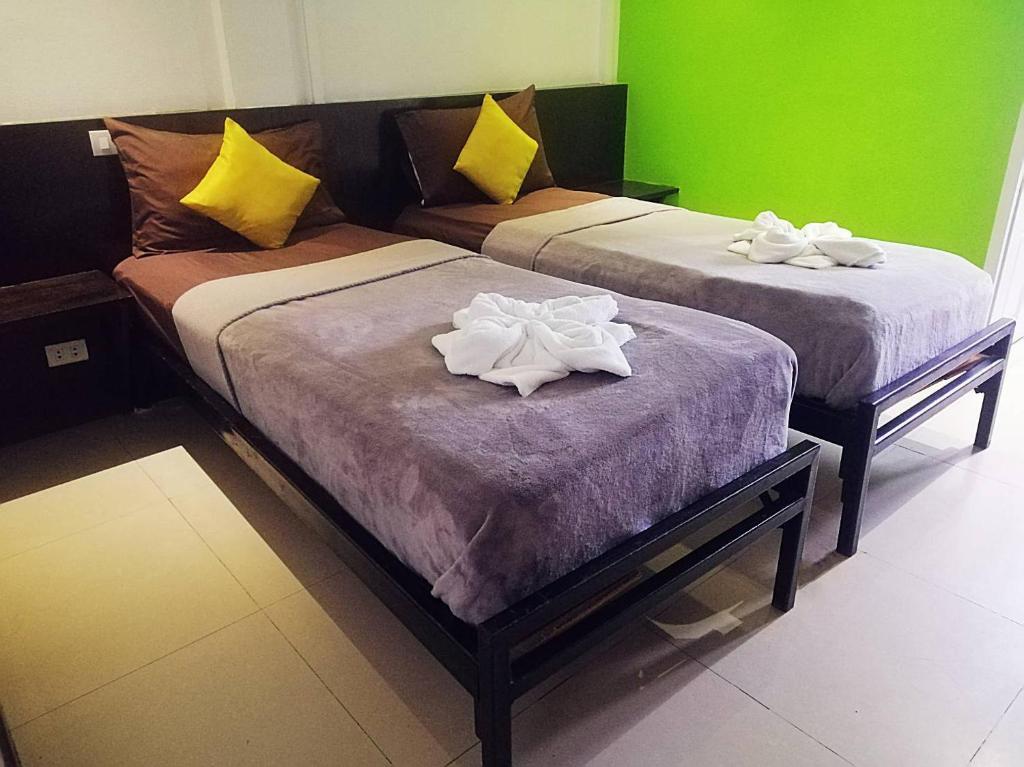 Postel nebo postele na pokoji v ubytování Colorize Boutique Hotel