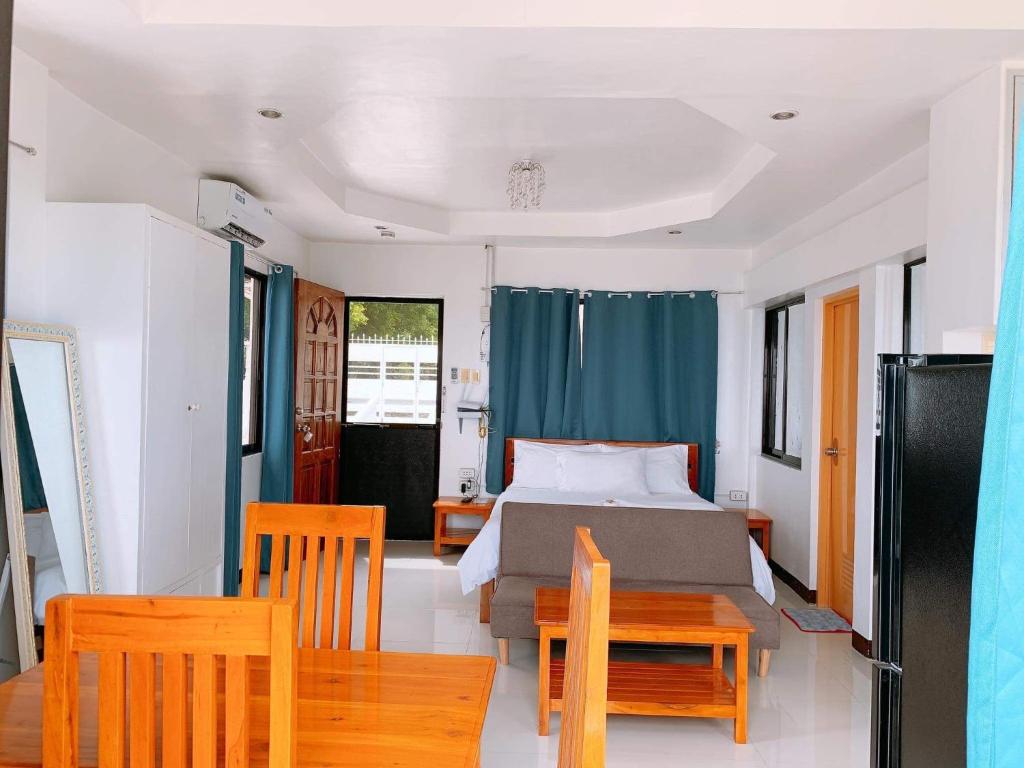 Postel nebo postele na pokoji v ubytování LUNA OSLOB TRAVELLERS INN - Beach Front