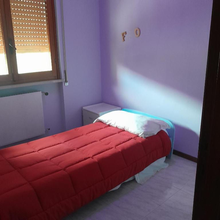 Postel nebo postele na pokoji v ubytování Albergo Caprile