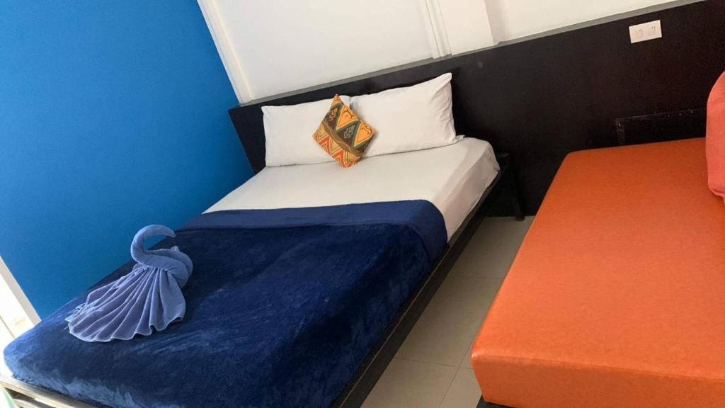 Postel nebo postele na pokoji v ubytování Colorize Boutique Hotel