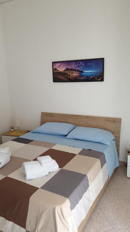Katil atau katil-katil dalam bilik di Holiday house Isabel