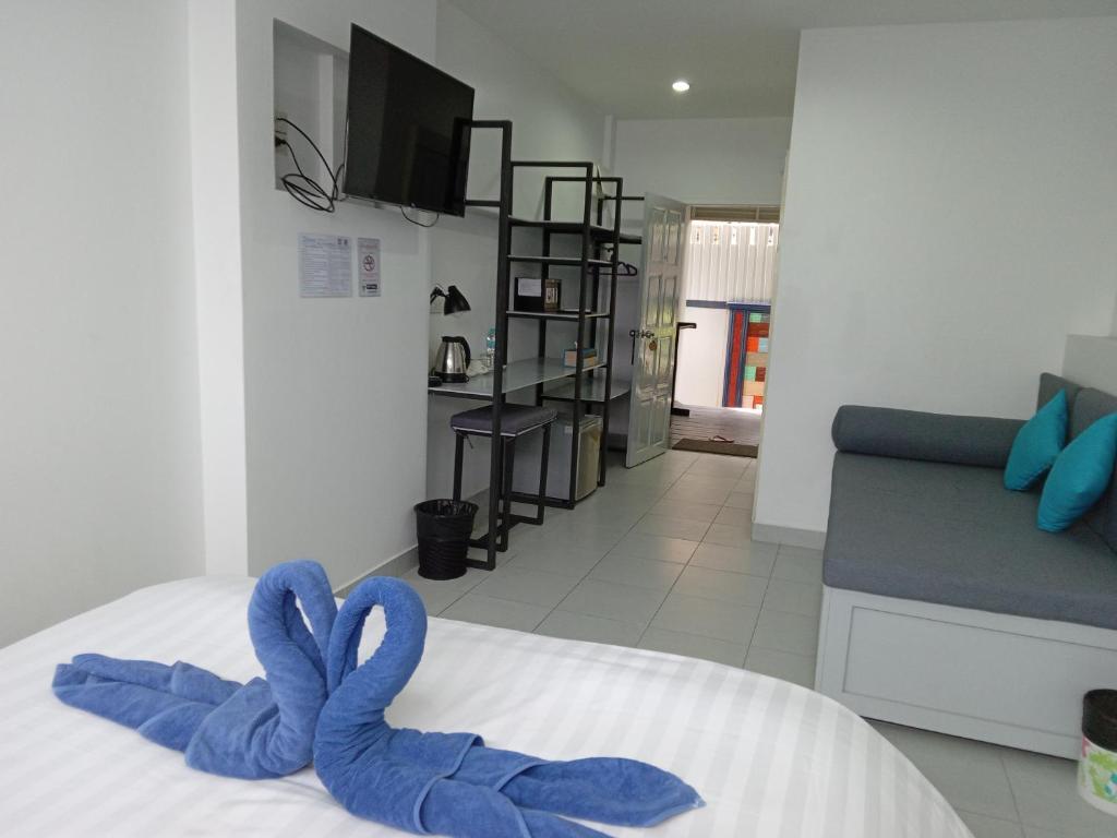Postel nebo postele na pokoji v ubytování Colorize Boutique Hotel