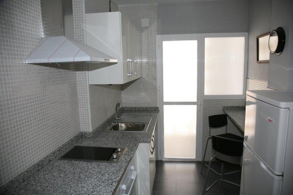 Kuchyň nebo kuchyňský kout v ubytování Macarena Flat